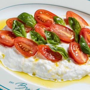 Burrata with cherry tomato and basil
